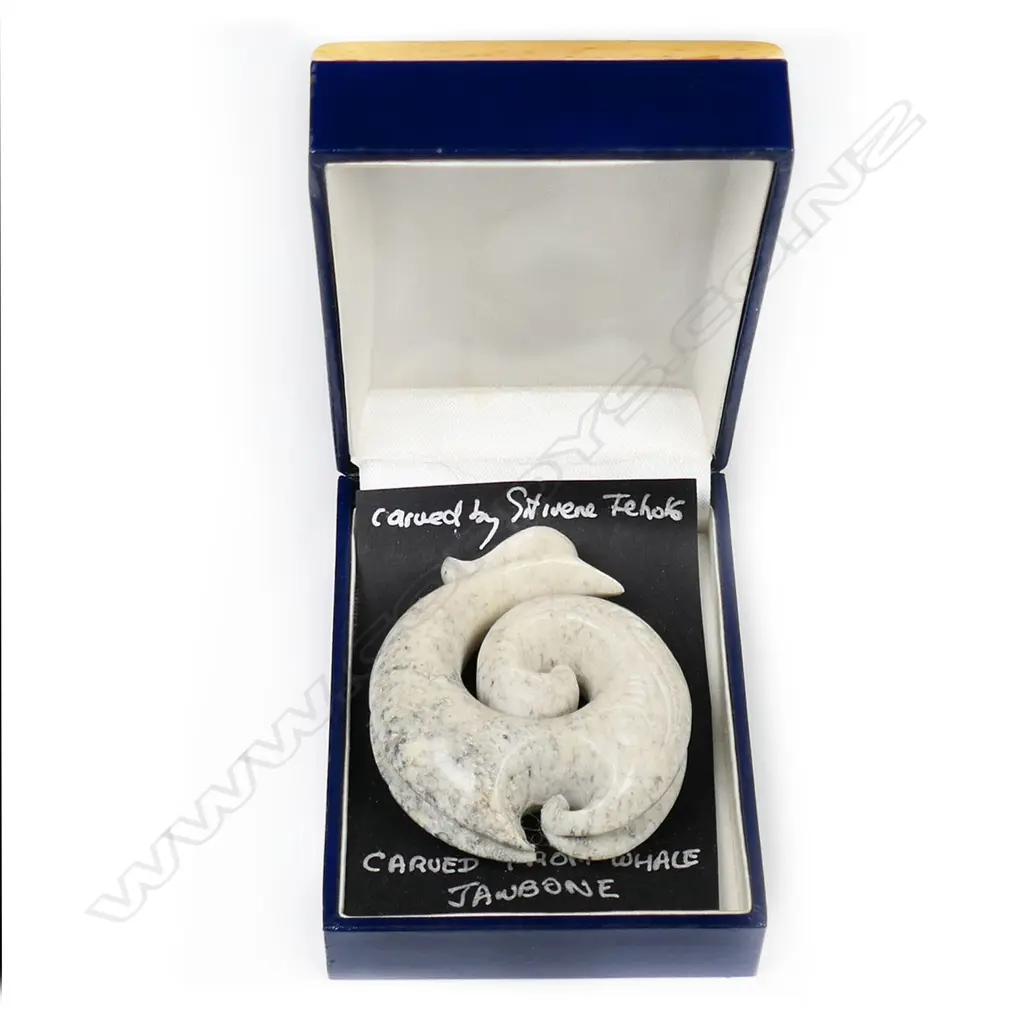 A carved whale jawbone pendant, Image 1++